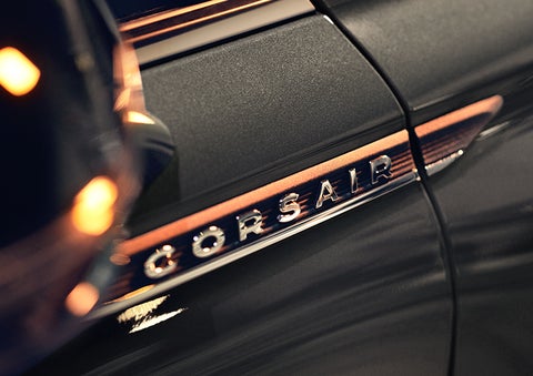 The stylish chrome badge reading “CORSAIR” is shown on the exterior of the vehicle. | Lincoln Cosmos Demo in Derwood MD